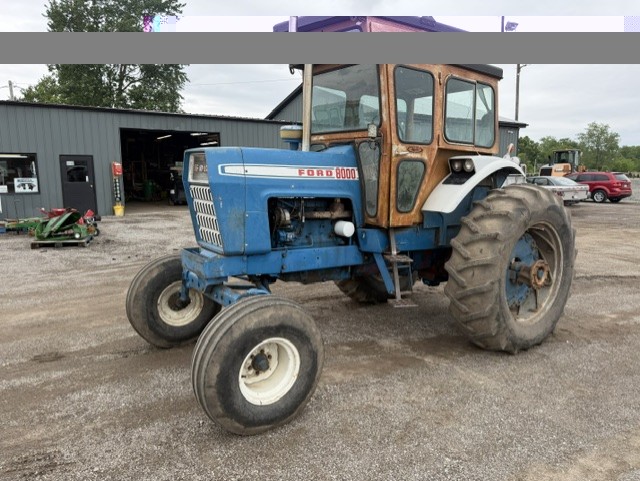 John Deere grain drill on steel transport wheels